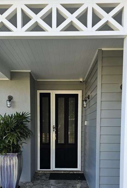 Prowler Proof ForceField hinge security door with ForceField fixed window screen as a sidelight